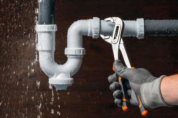 Professional Emergency Plumber technician working in Corydon, IA